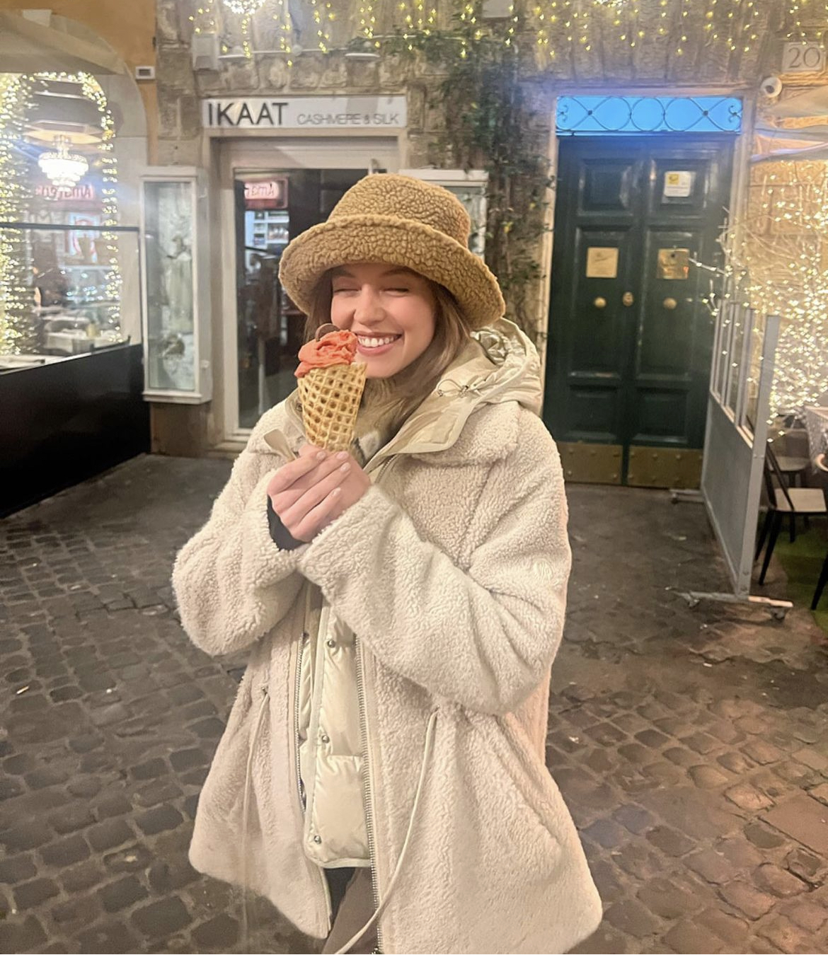 Cream Fleece Coat Layered with a Puffer Vest — Italy Winter Outfits