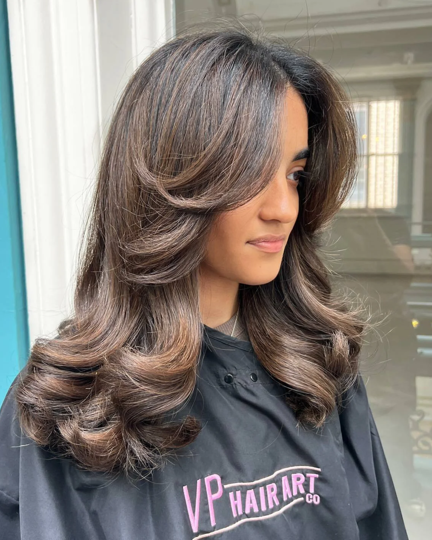 Layered Bob with Side-Swept Bangs Layered Bob with Side-Swept Bangs β Winter Haircuts for Thick Hair