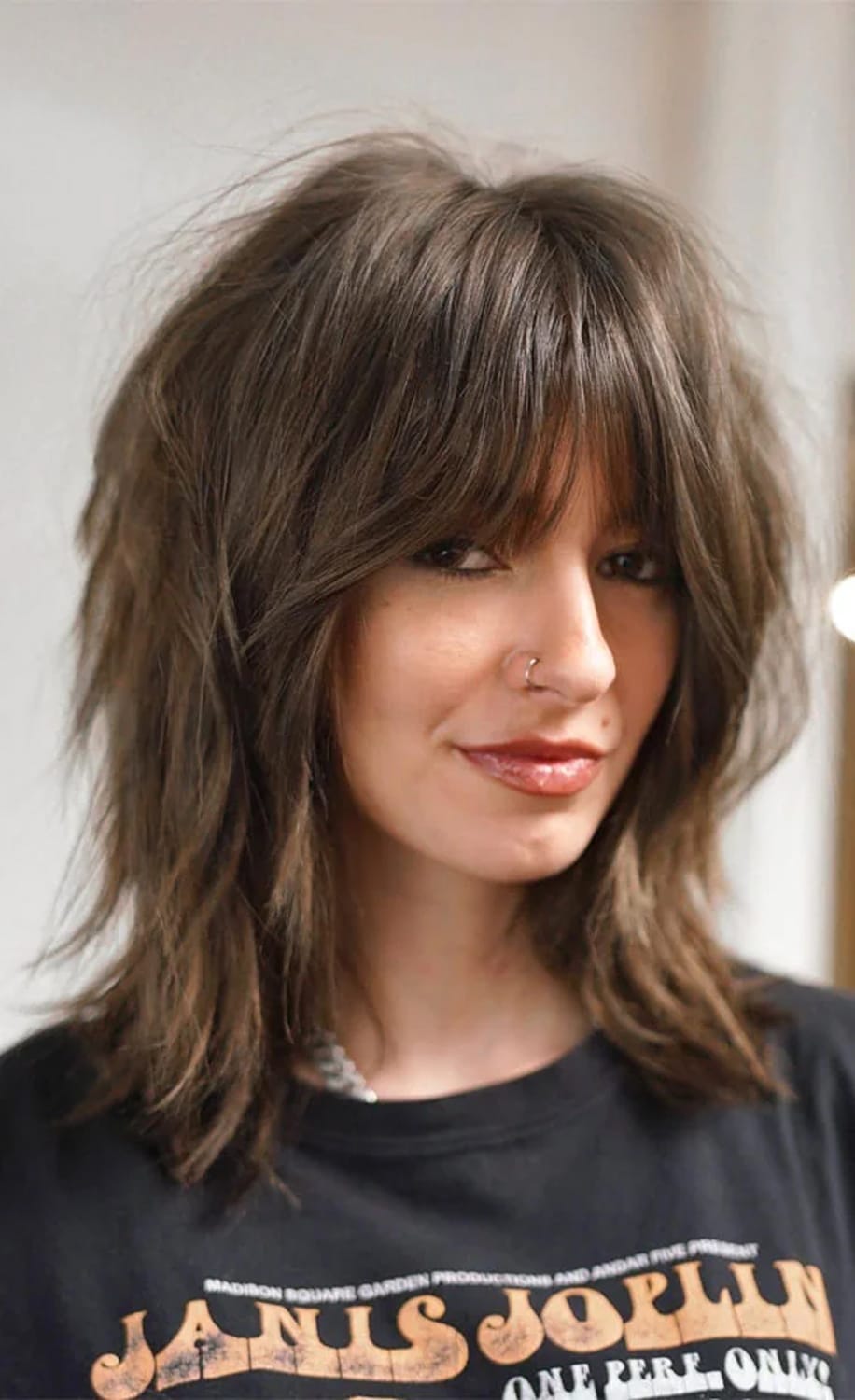 Dark Brown With Subtle Highlights Collarbone Shag With Textured Bangs Dark Brown With Subtle Highlights Collarbone Shag With Textured Bangs β Winter Haircuts for Thin Hair