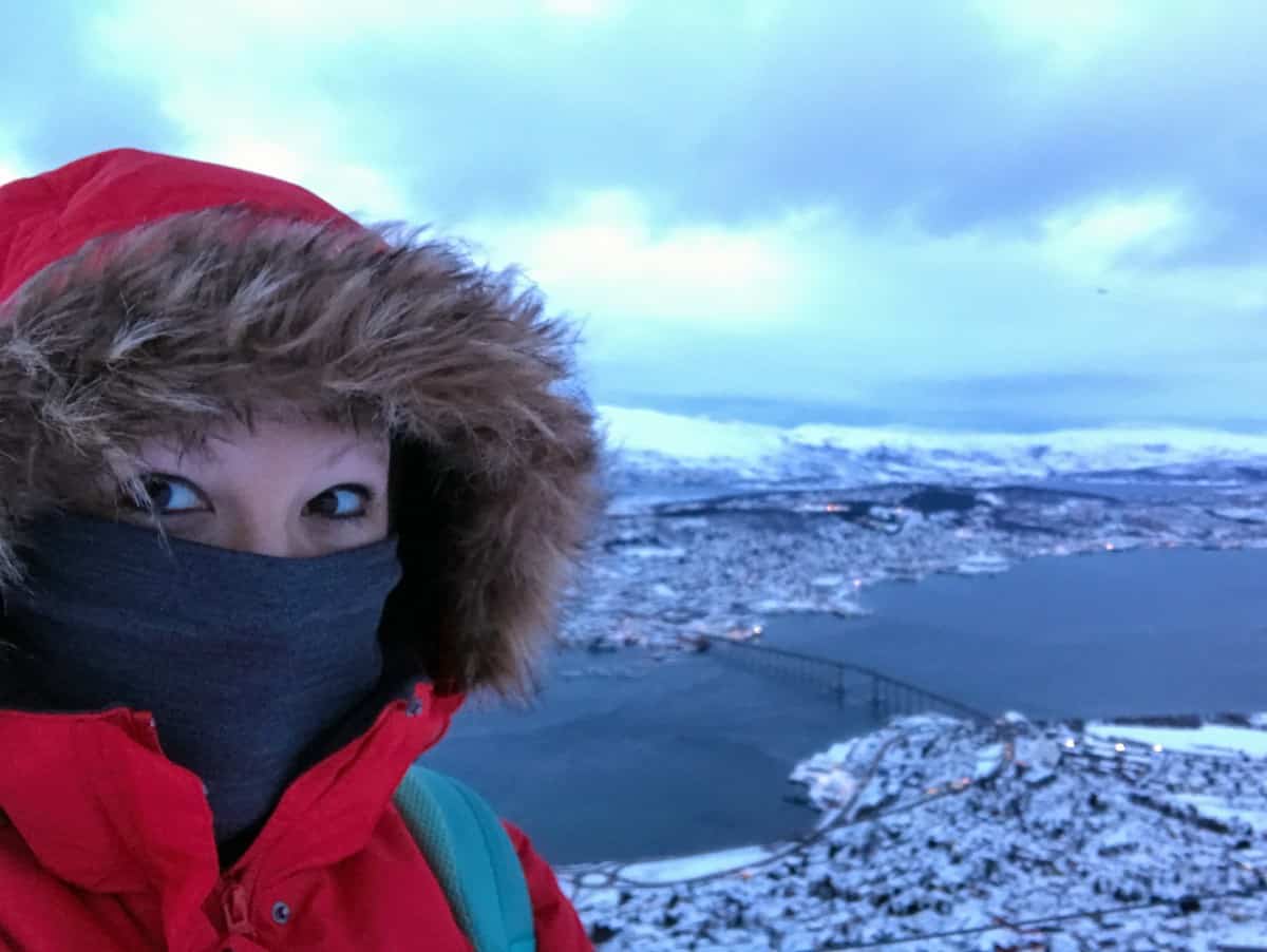Brown Hooded Parka Styled With Vibrant Orange Hiking Boots Brown Hooded Parka Styled With Vibrant Orange Hiking Boots β Iceland Winter Outfits