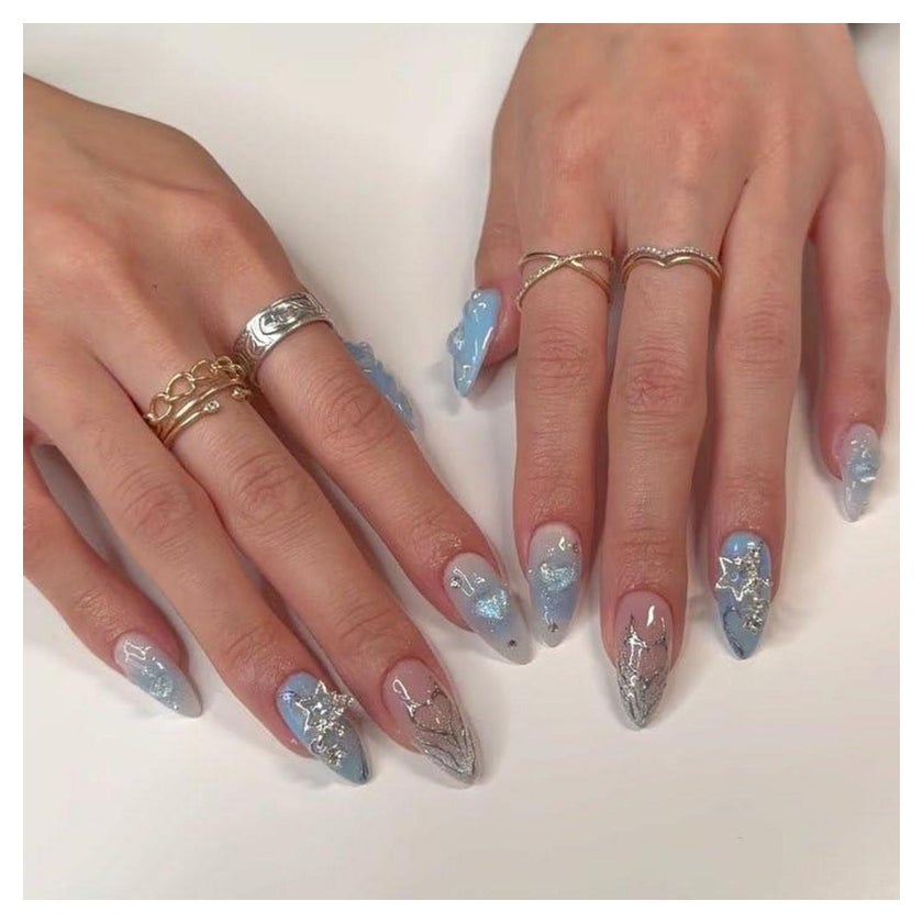 Celestial Winter Stars and Foil Accents Celestial Winter Stars and Foil Accents β Coquette Winter Nails