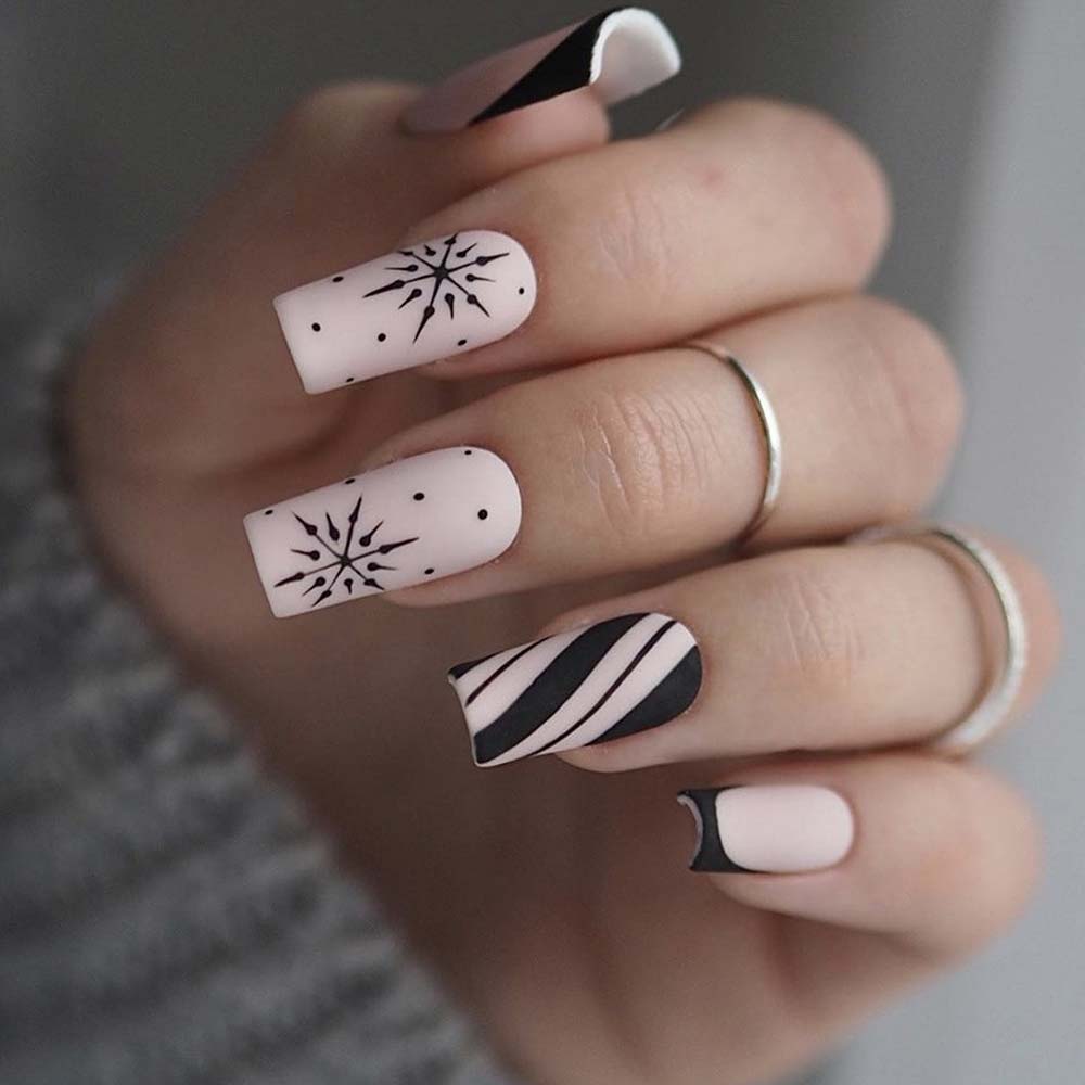 Pale Pink Square Nails with Black Graphic Snowflakes Pale Pink Square Nails with Black Graphic Snowflakes β Snowflake Nails
