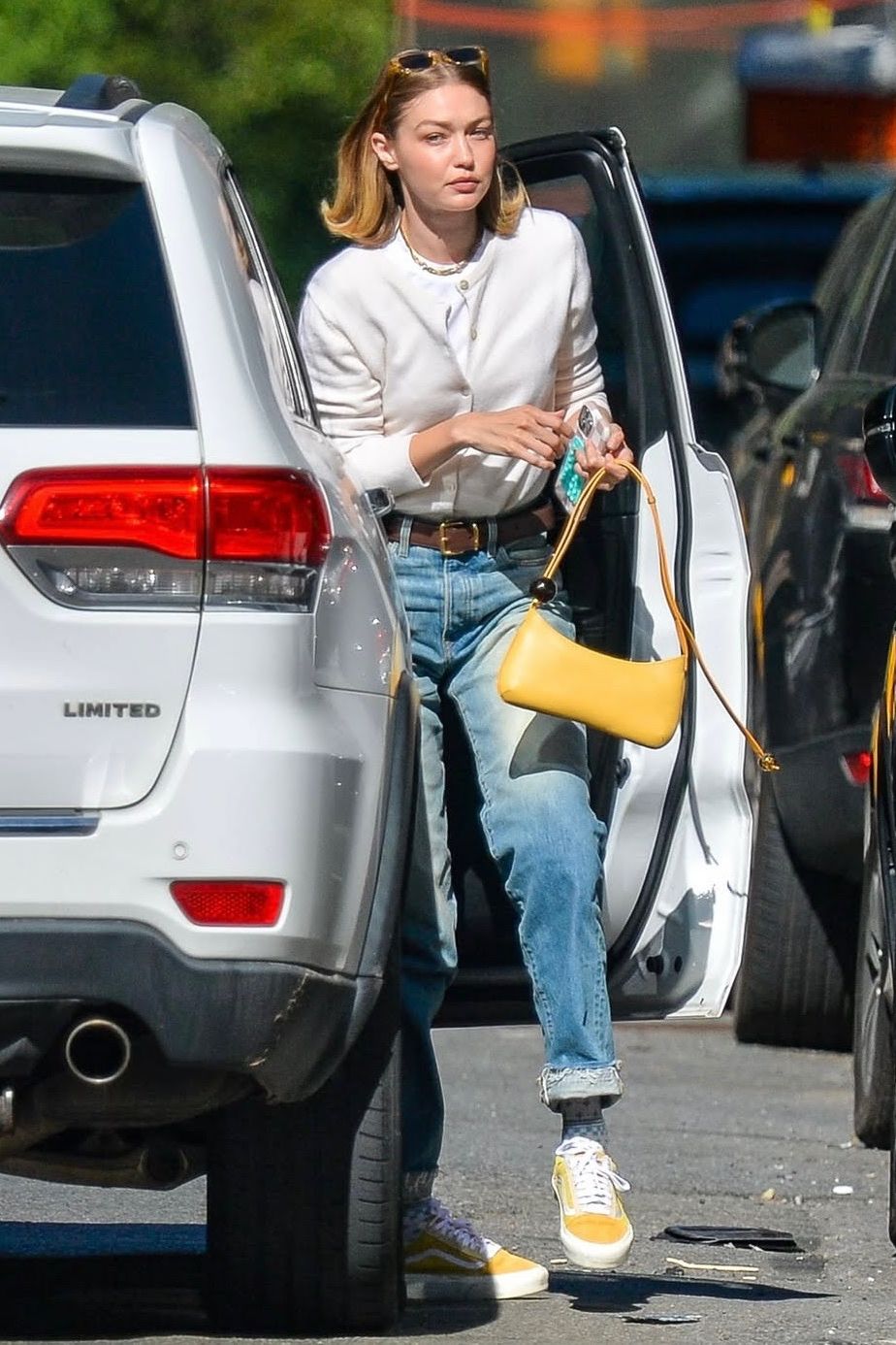 Blue Jeans and White Cardigan with Yellow Sneakers — Winter Outfits with Sneakers