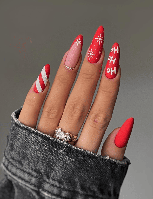 Long Stiletto Matte Red Text & Candy Cane — Christmas Nail Designs 2026