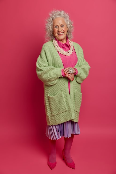 Vibrant Pink and Green Knit Cardigan Ensemble Vibrant Pink and Green Knit Cardigan Ensemble β Winter Outfits for Women Over 70