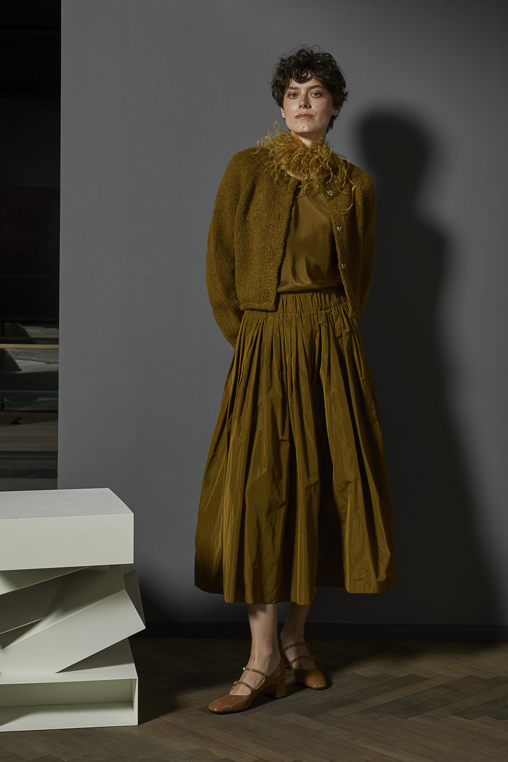 Elegant Layers: Silk Blouse with Knit Cardigan and Midi Skirt — Late Winter Outfits