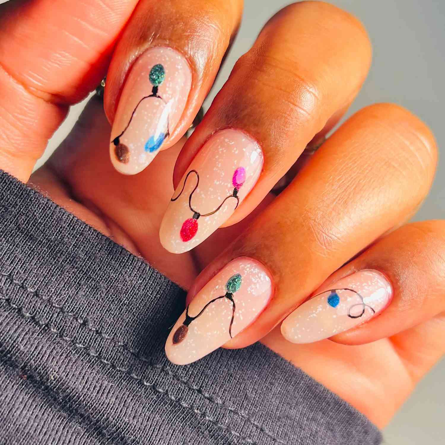 Pale Pink String Light Almond Nails Pale Pink String Light Almond Nails β Christmas Gel X Nails 2026