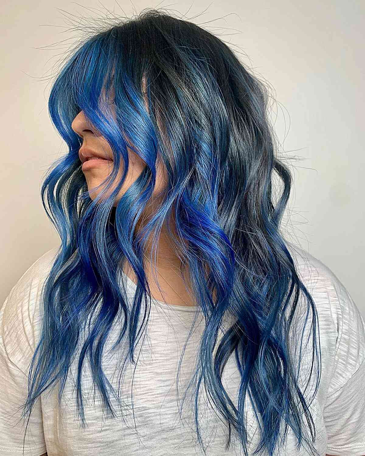Dark Base With Bright Blue Streaks Dark Base With Bright Blue Streaks β Winter Hair Colors for Blue Eyes