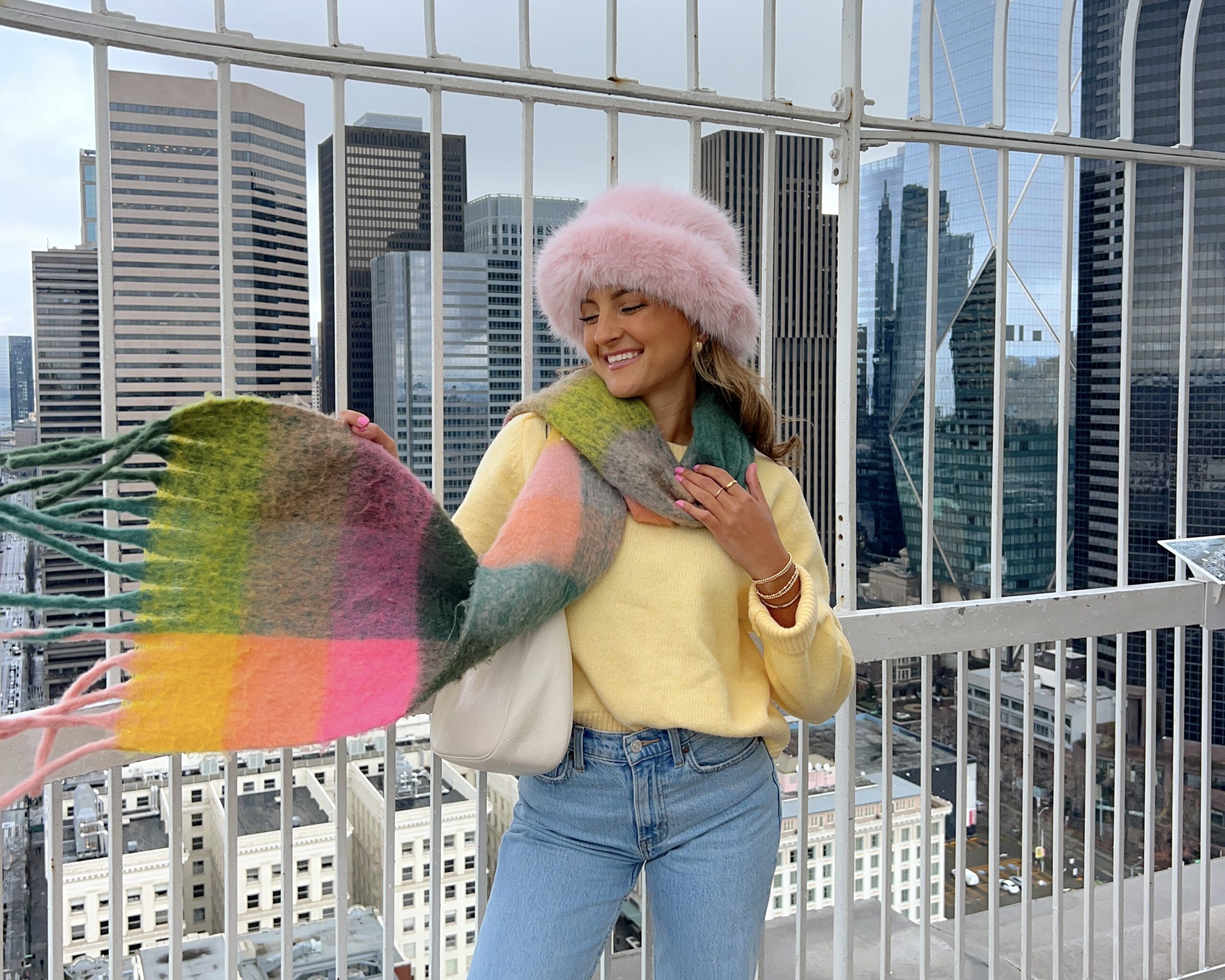 Cheerful Yellow Sweater with Striped Scarf and Pink Hat — January Outfits