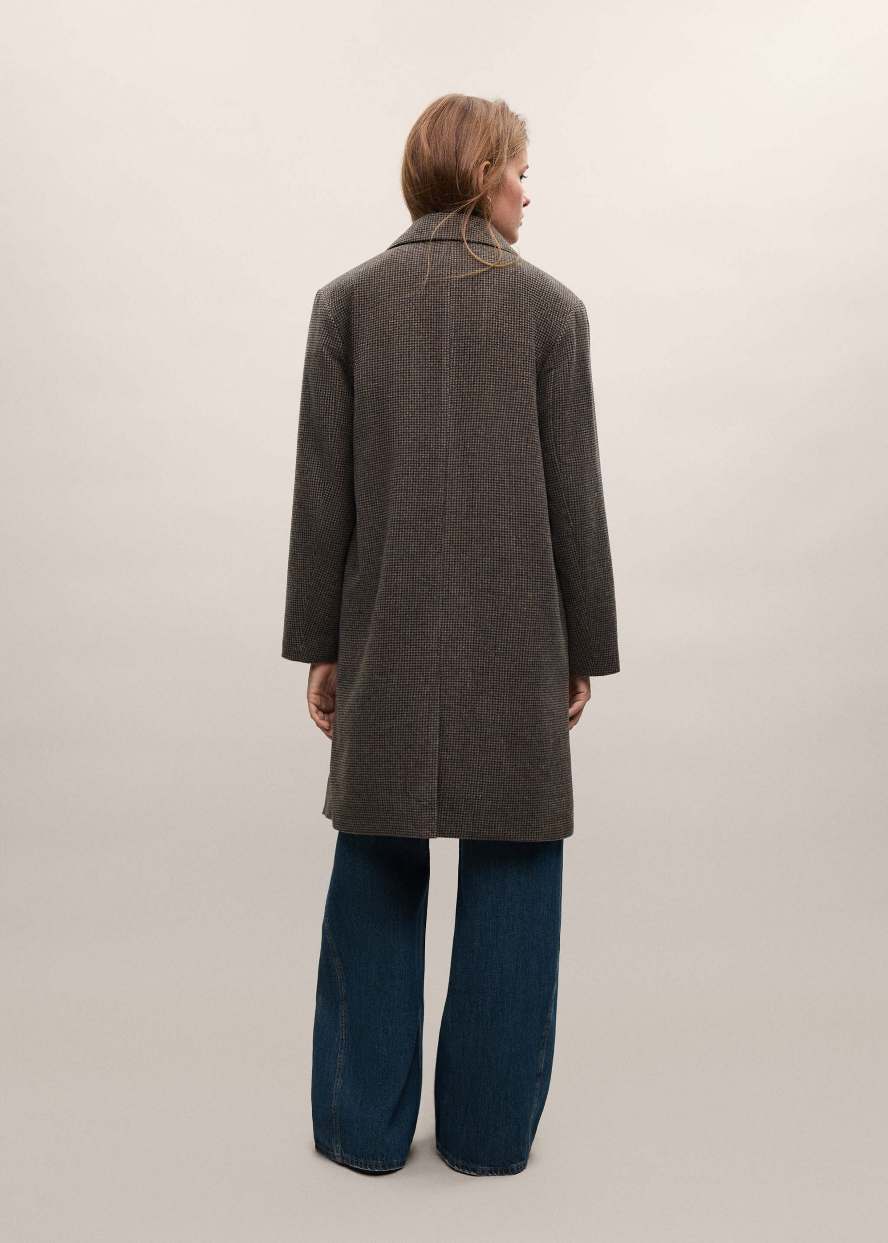 Sweater Vest with Wide-Leg Jeans for a Trendy Layered Look — Winter College Outfits