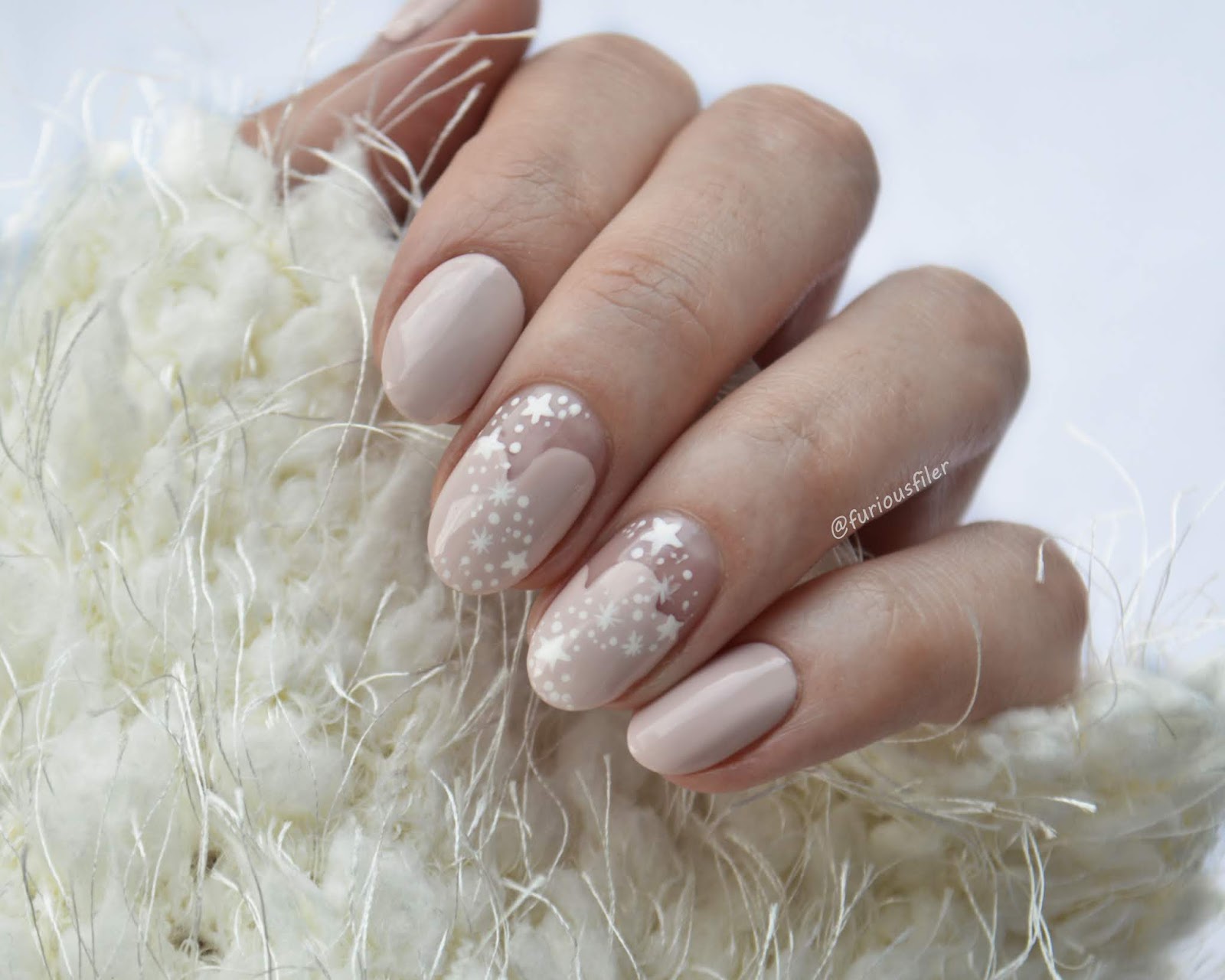 Sheer Nude Snowflake Oval Nails — Medium Length Winter Nails