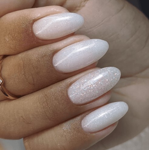 Off-White Iridescent Shimmer Oval Nails Off-White Iridescent Shimmer Oval Nails β Christmas Nails for Women Over 50 2026