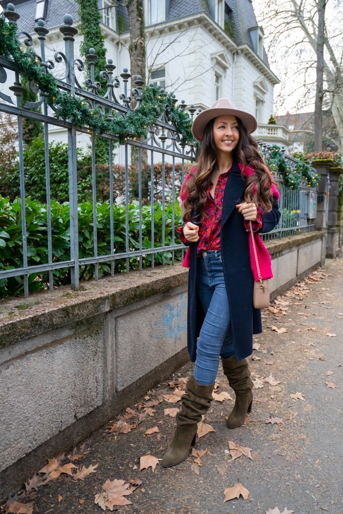 Bold Pink Jacket Under a Navy Coat for Color Contrast — Winter Layering Outfits