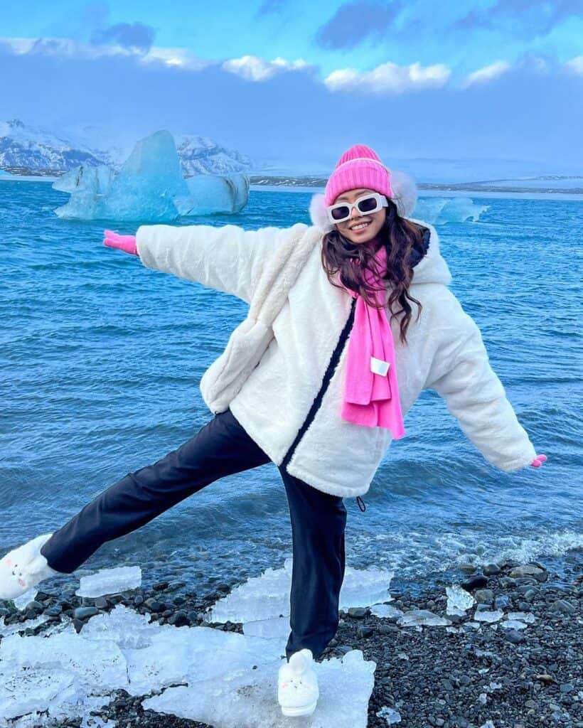 White Fluffy Jacket With Black Trim And A Pink Beanie Set White Fluffy Jacket With Black Trim And A Pink Beanie Set β Iceland Winter Outfits