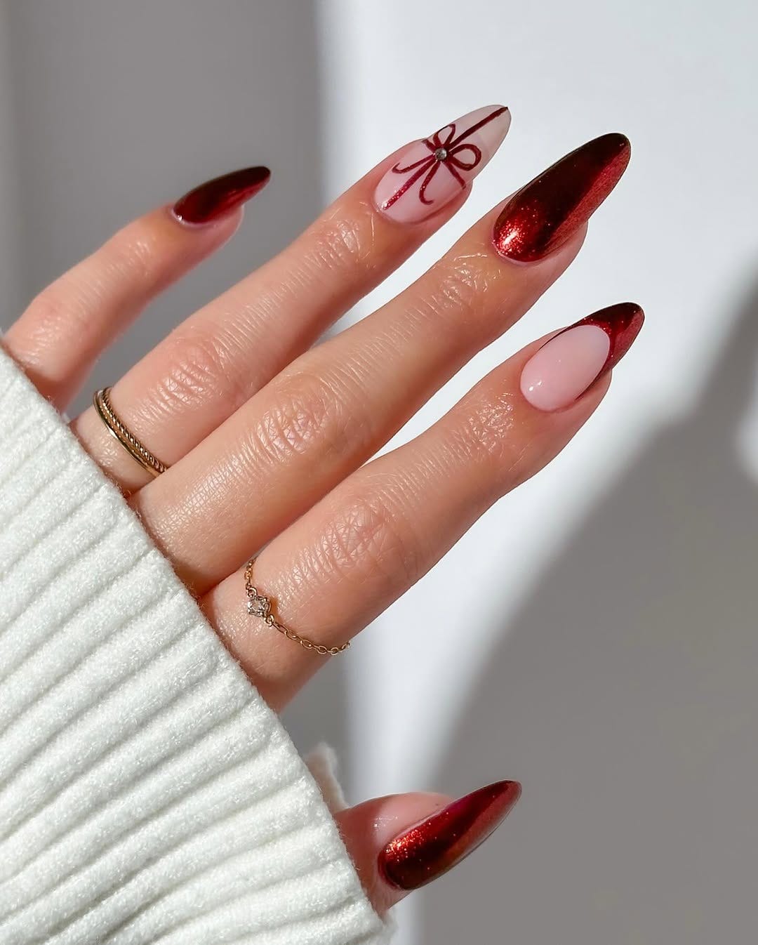 Sheer Pink with Metallic Red French Tips and Bow Sheer Pink with Metallic Red French Tips and Bow β Winter Party Nails
