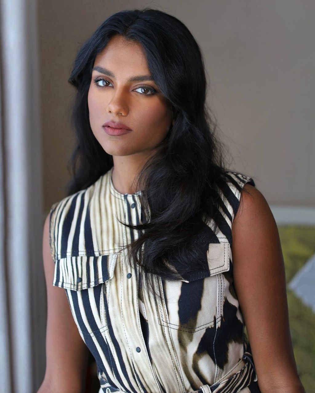 Rich Brown With Warm Highlights Mid-Back Layers with Smooth Waves — Winter Haircuts for Wavy Hair