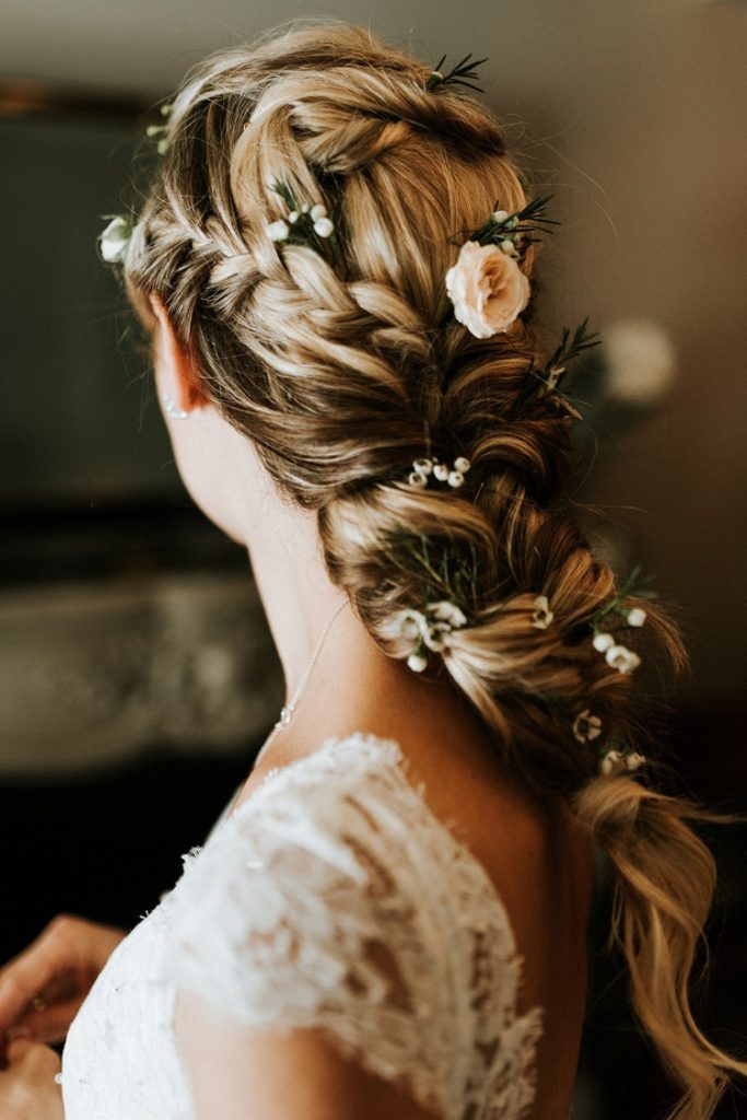 Braided Updo With Floral Accents Braided Updo With Floral Accents β Winter Formal Hairstyles