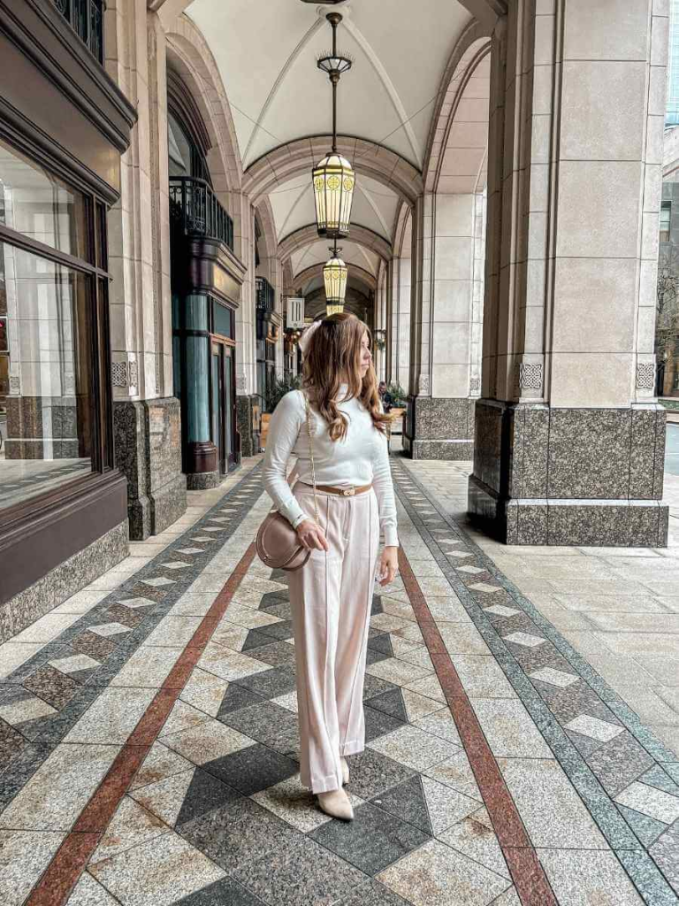 Cream Sweater and Beige Wide-Leg Trousers with Gold Accents — Old Money Winter Outfits