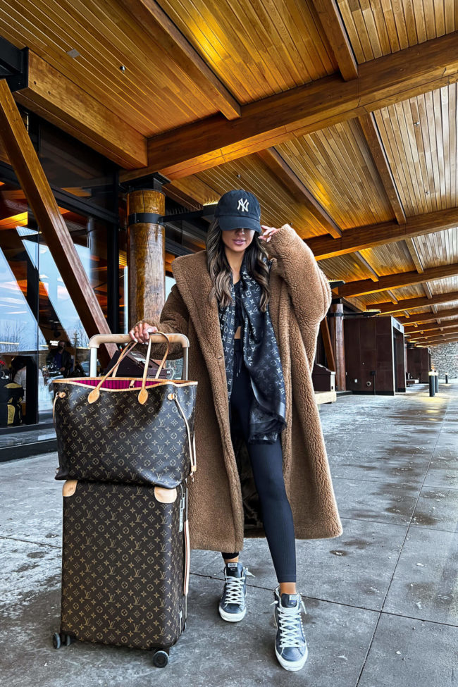 Oversized Teddy Coat with Athletic Wear and Monogram Scarf for Travel Winter Airport Outfits