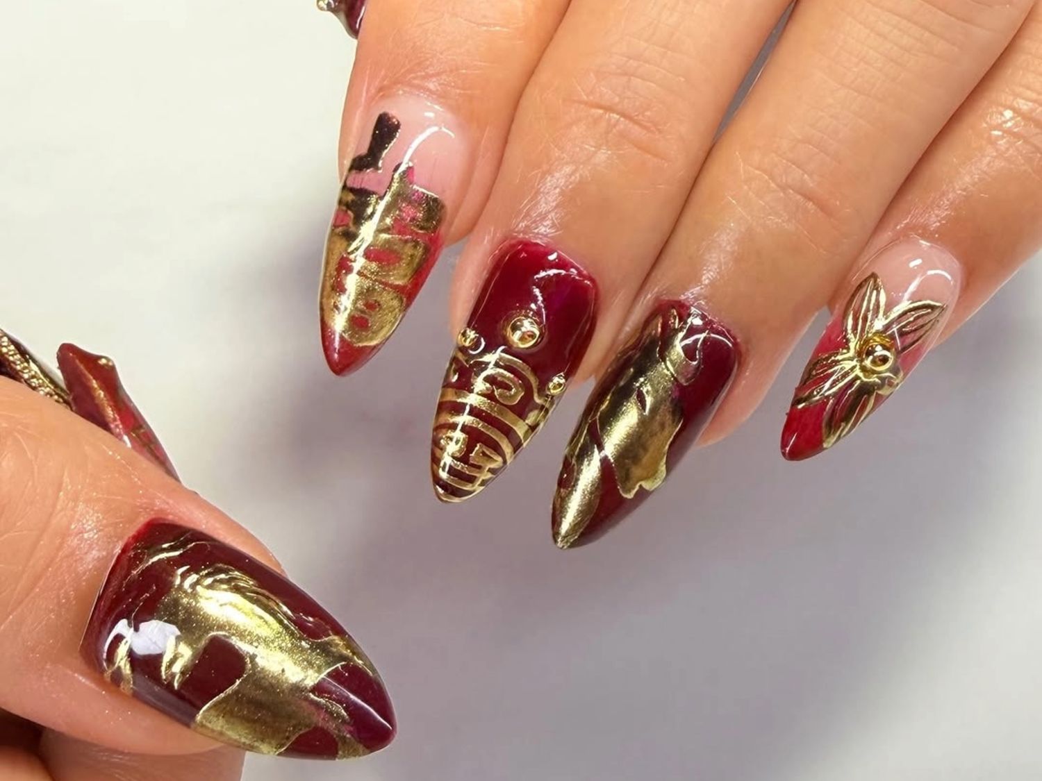 Deep Red With Gold Accents Clear Polish Visual Idea Deep Red With Gold Accents Clear Polish Visual Idea β New Years Acrylic Nails 2027