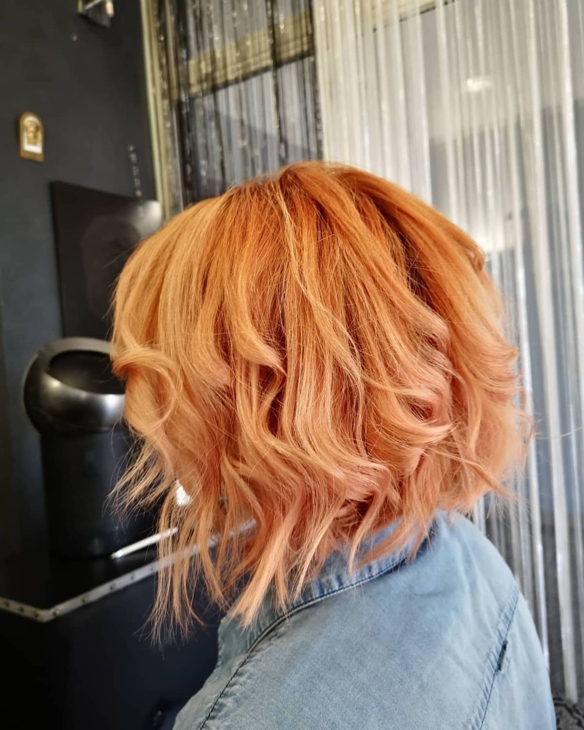 Vibrant Copper Wavy Bob — Winter Hair Colors for Short Hair