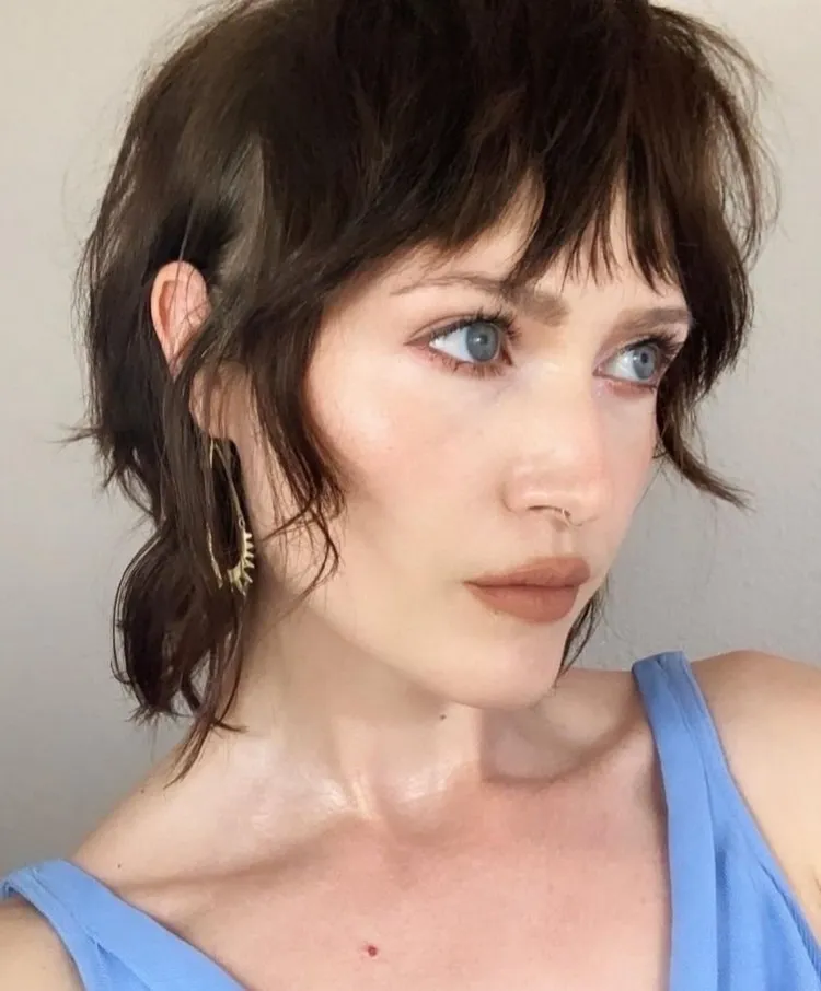 Dark Brown Wavy Shag with Wispy Bangs Dark Brown Wavy Shag with Wispy Bangs β Winter Haircuts for Women