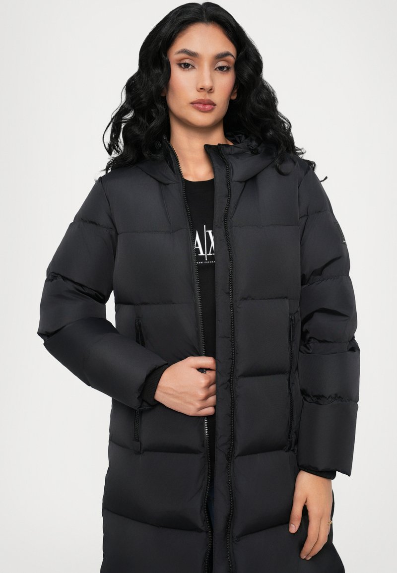 Casual Sleek Quilted Long Black Puffer Coat Detail — Long Puffer Coat Outfits