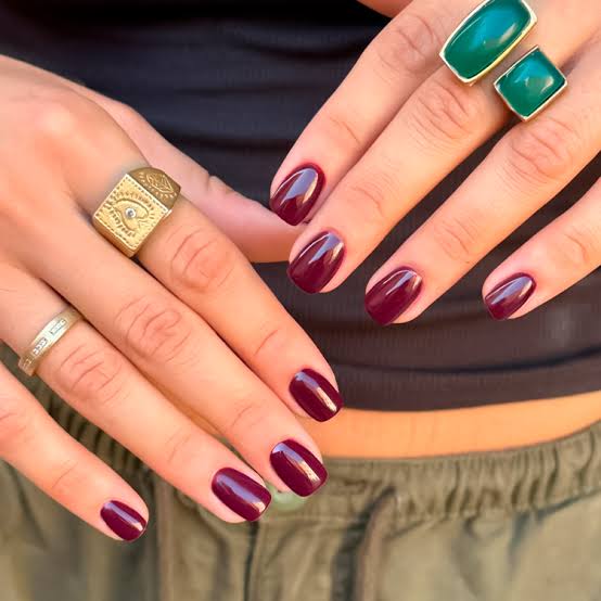 Short Oval Deep Plum Glossy Nails — Holiday Nail Colors 2026