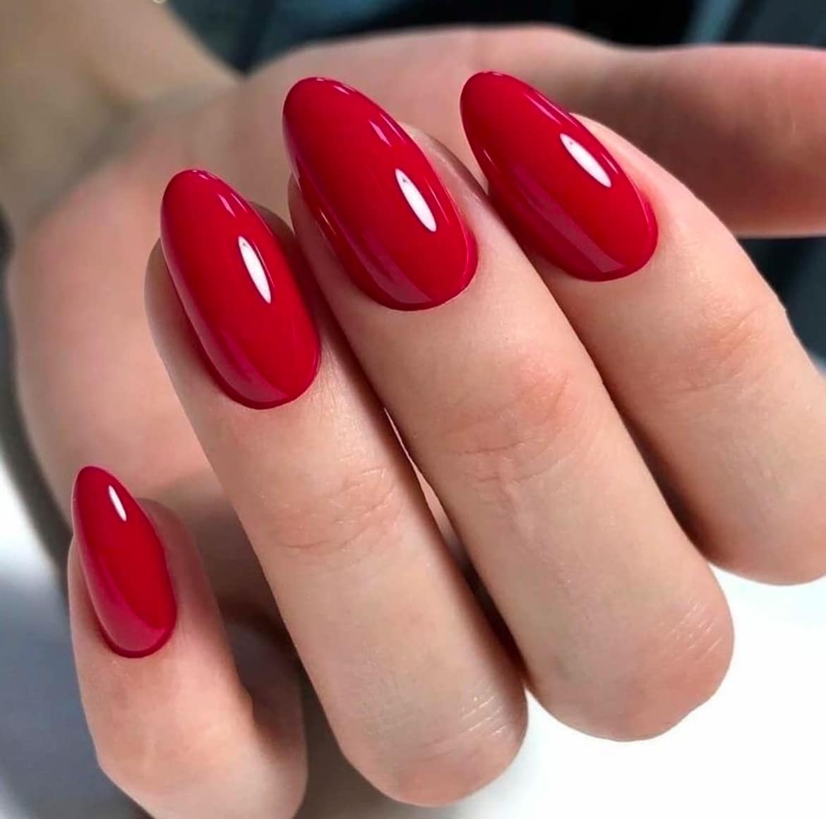 Vibrant High-Gloss Red Medium Oval Nails — Red Christmas Nails 2026