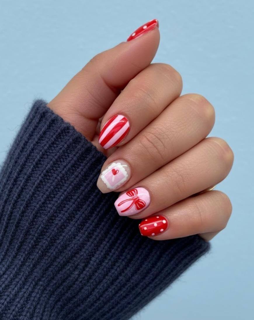 Playful Holiday Motifs Short Oval Nails Playful Holiday Motifs Short Oval Nails β Easy Christmas Nails 2026