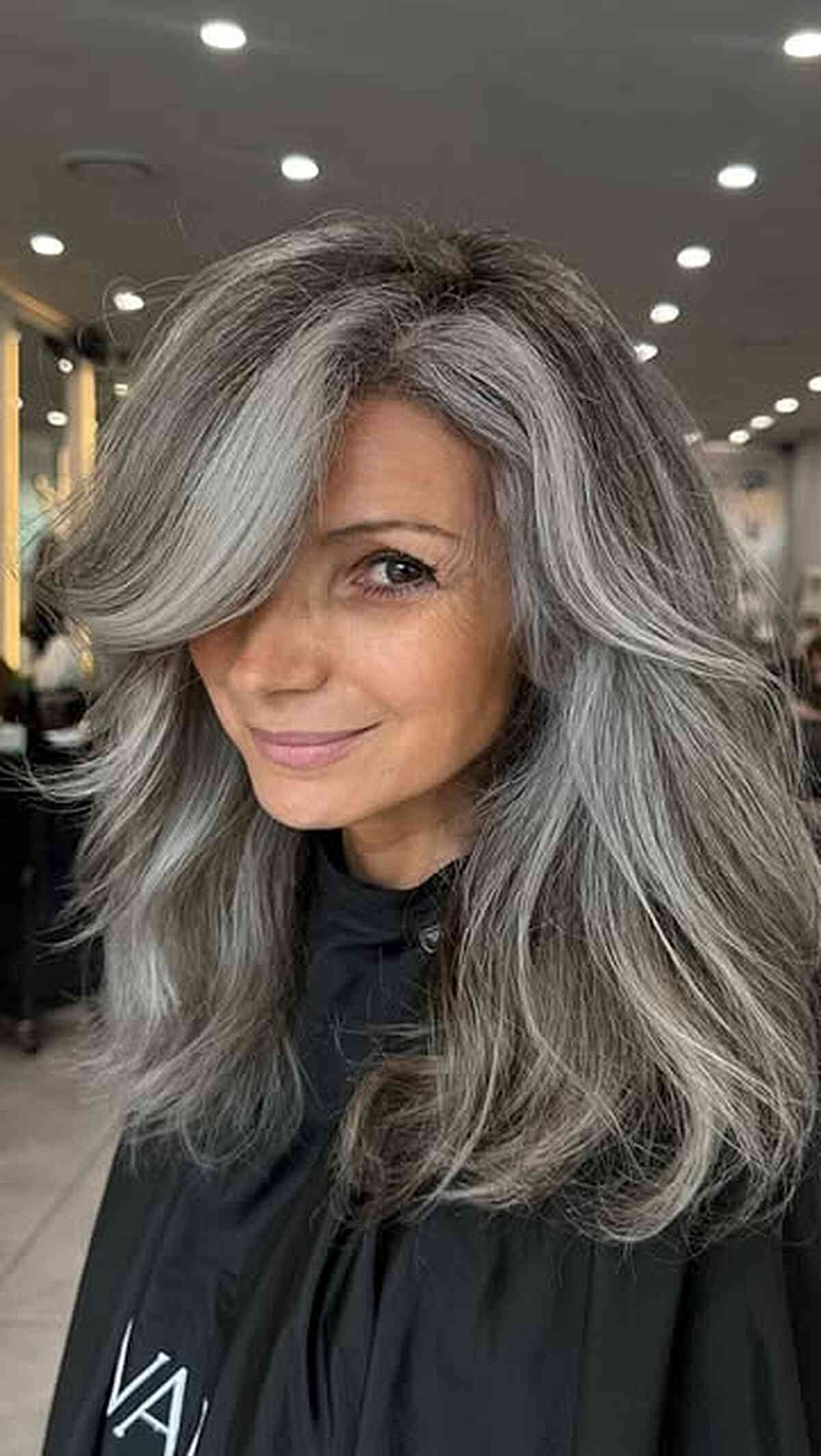 Voluminous Salt and Pepper Layers Voluminous Salt and Pepper Layers β Winter Hairstyles for Women Over 50