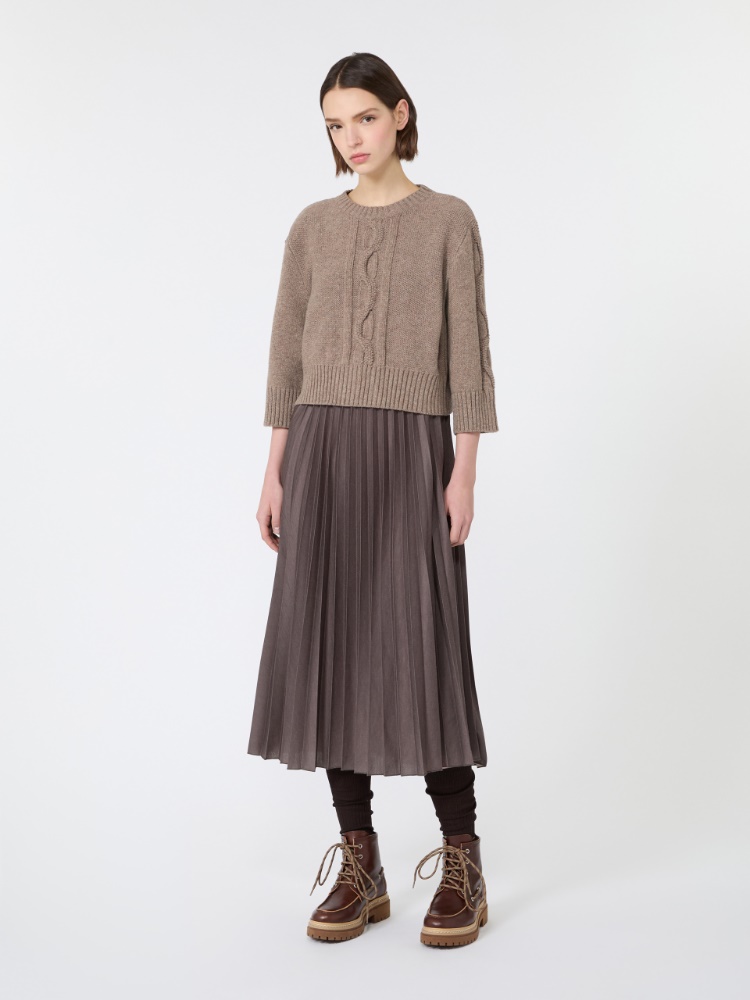 Cable-Knit Sweater with Pleated Skirt for Textured Winter Appeal — Winter Outfits for Moms