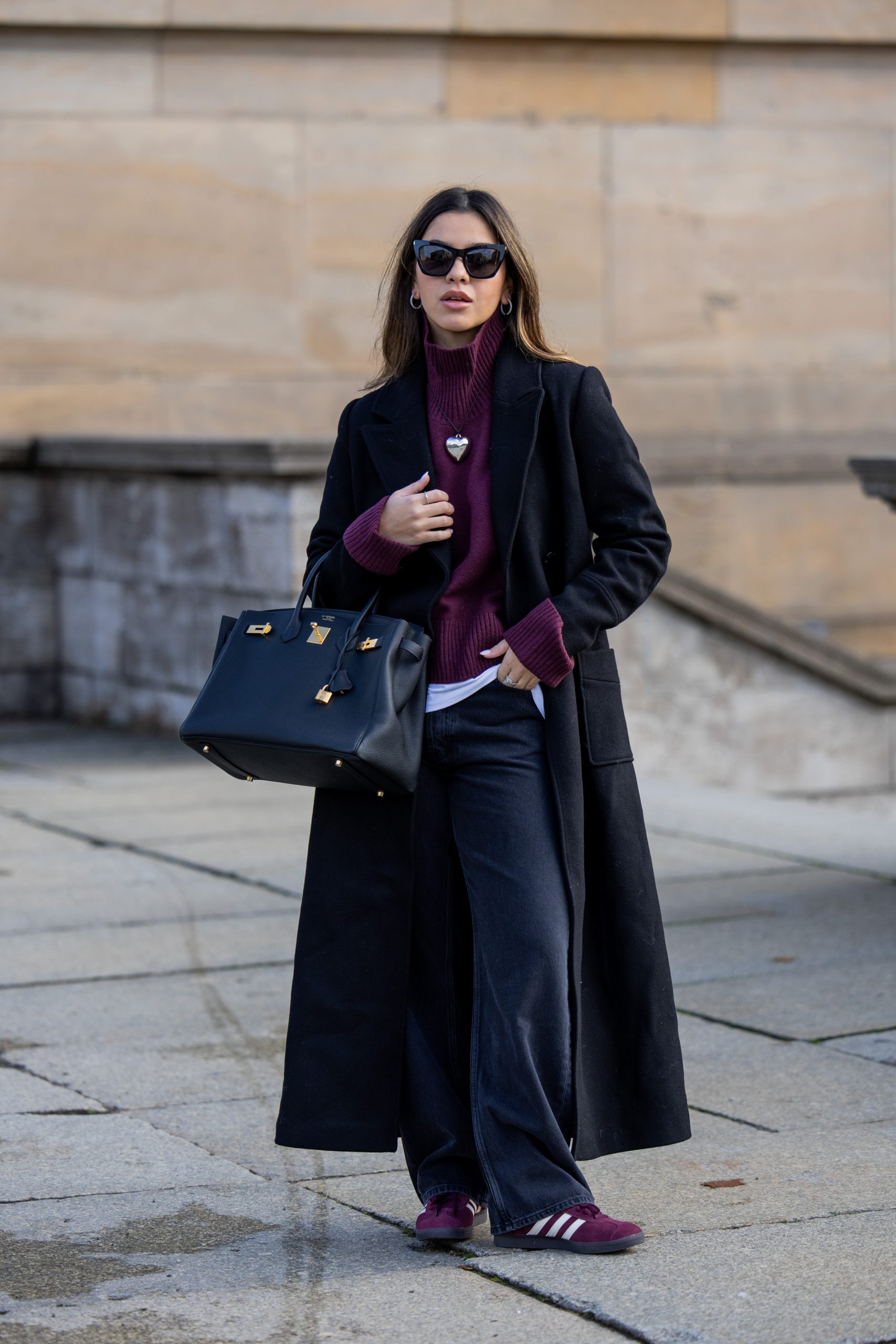 Black Long Coat Over Burgundy Turtleneck and Jeans — Italy Winter Outfits