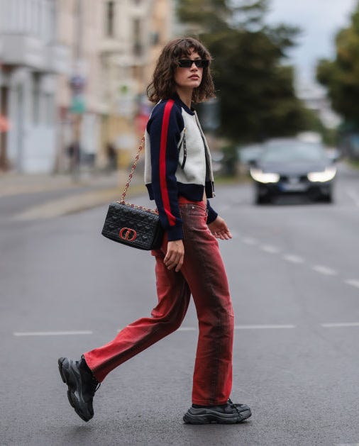 Bomber Jacket and Red Jeans with Chunky Black Sneakers — Winter Outfits with Sneakers