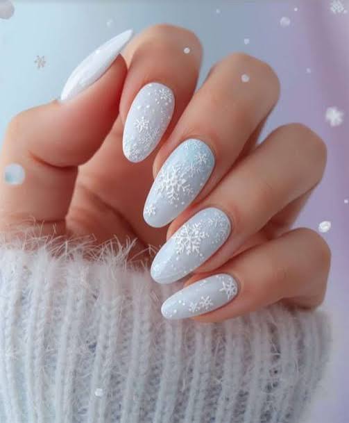Matte Blue and White Snowflake Almonds Matte Blue and White Snowflake Almonds β Snowflake Nails