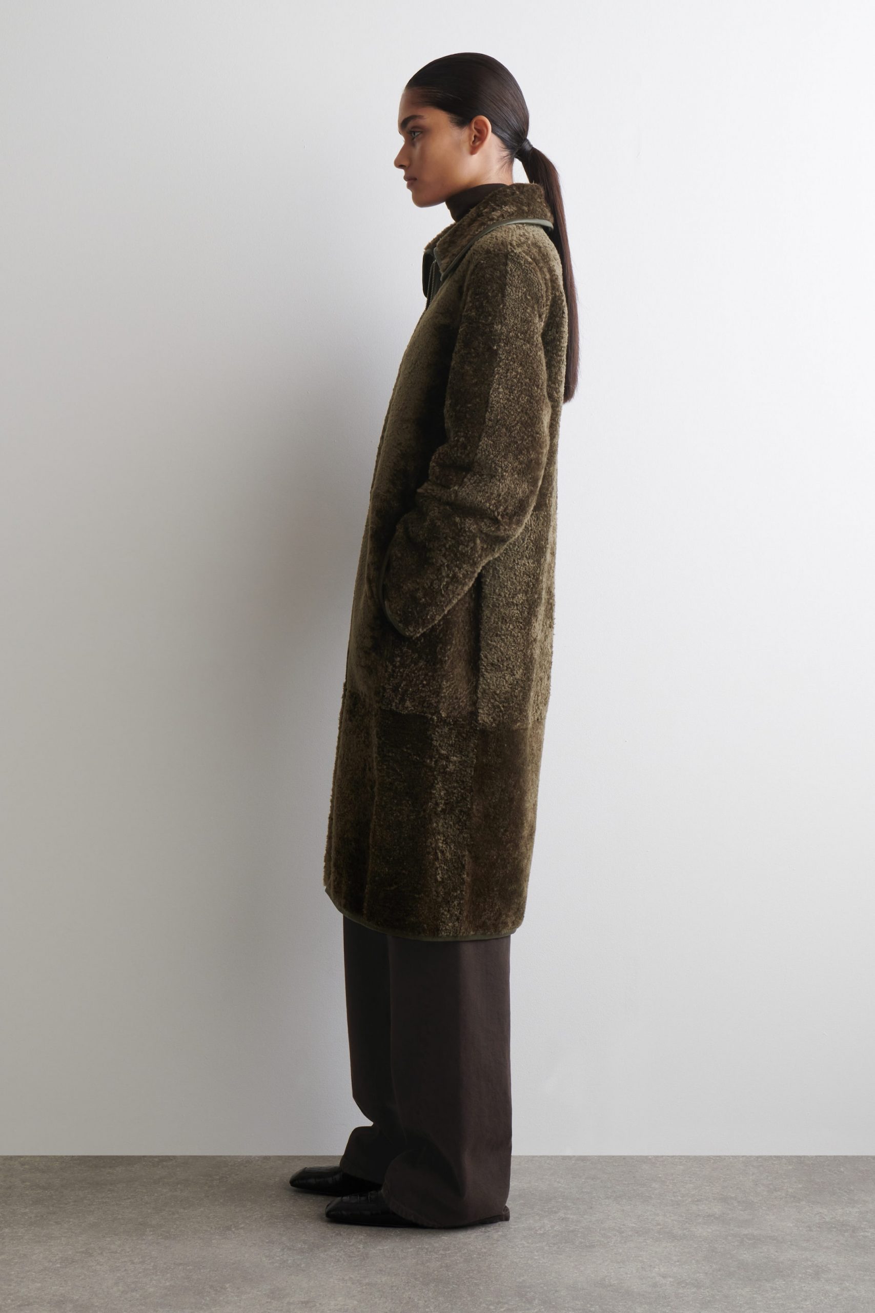 Olive Green Textured Shearling Coat with Wide-Leg Trousers — Shearling Coat Outfits