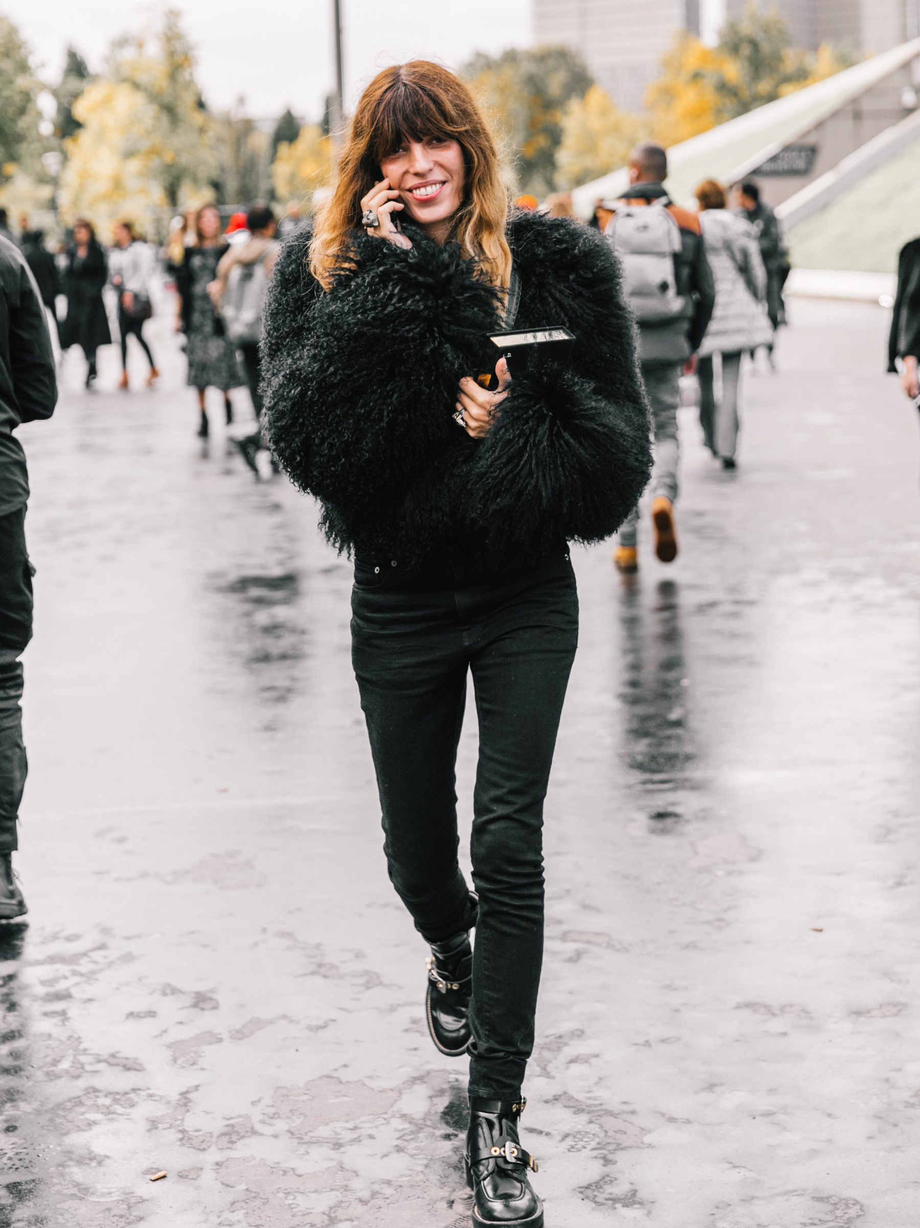 Voluminous Black Faux Fur Jacket with Dark Jeans — Cute Winter Outfits