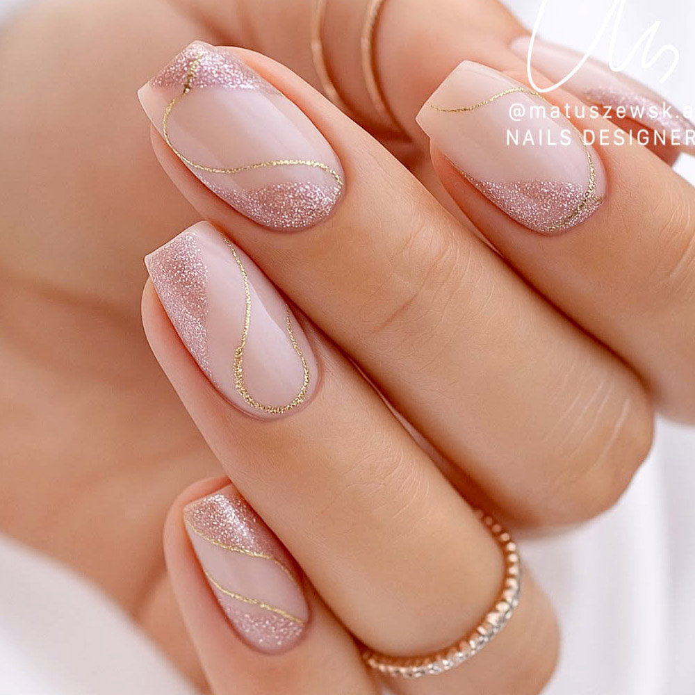 Nude Pink Swirl Lines Gold Glitter Nails Nude Pink Swirl Lines Gold Glitter Nails β New Years Nail Designs 2027