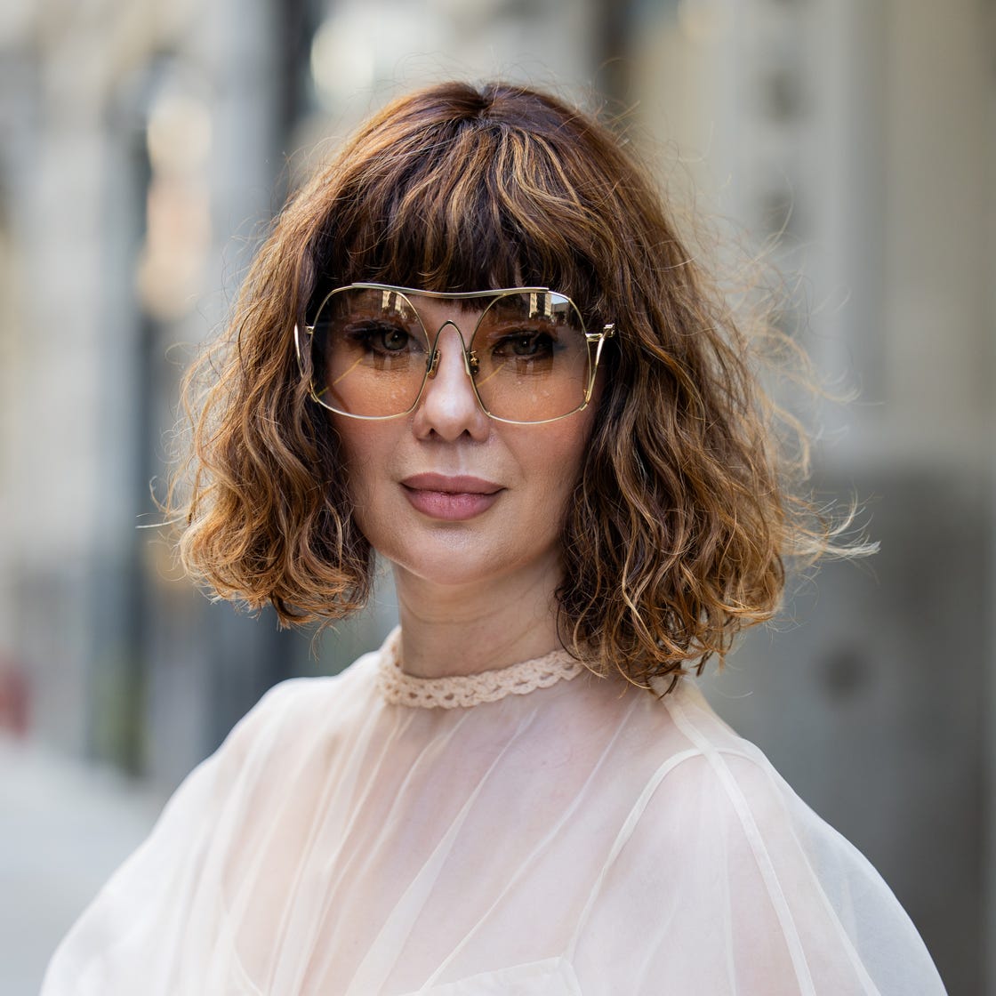 Ear To Chin Shag Bob with Blunt Bangs — Winter Haircuts for Wavy Hair