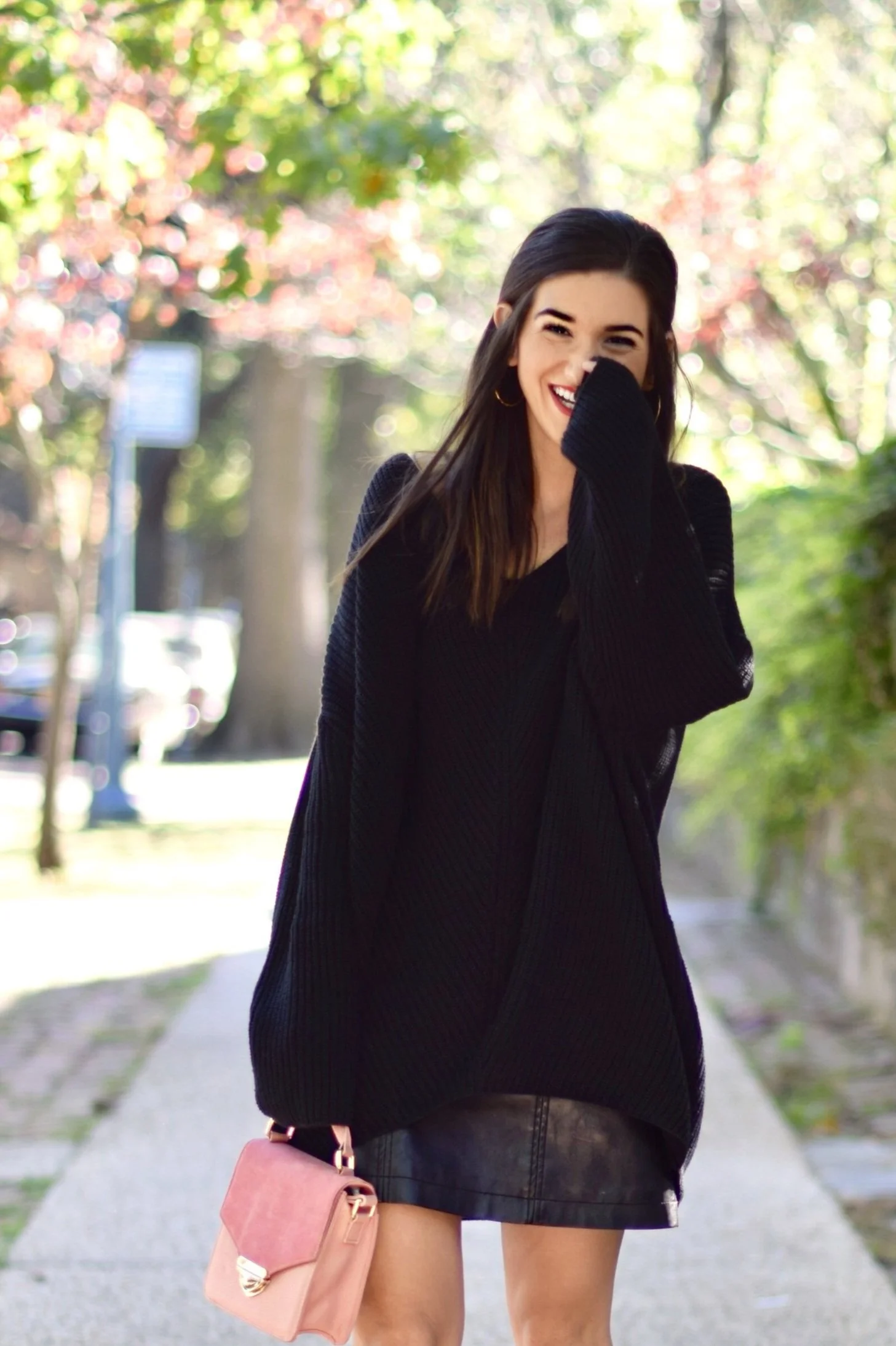 Black Oversized Sweater and Faux Leather Mini: Chic Contrast Black Oversized Sweater and Faux Leather Mini: Chic Contrast β Oversized Sweater Outfits