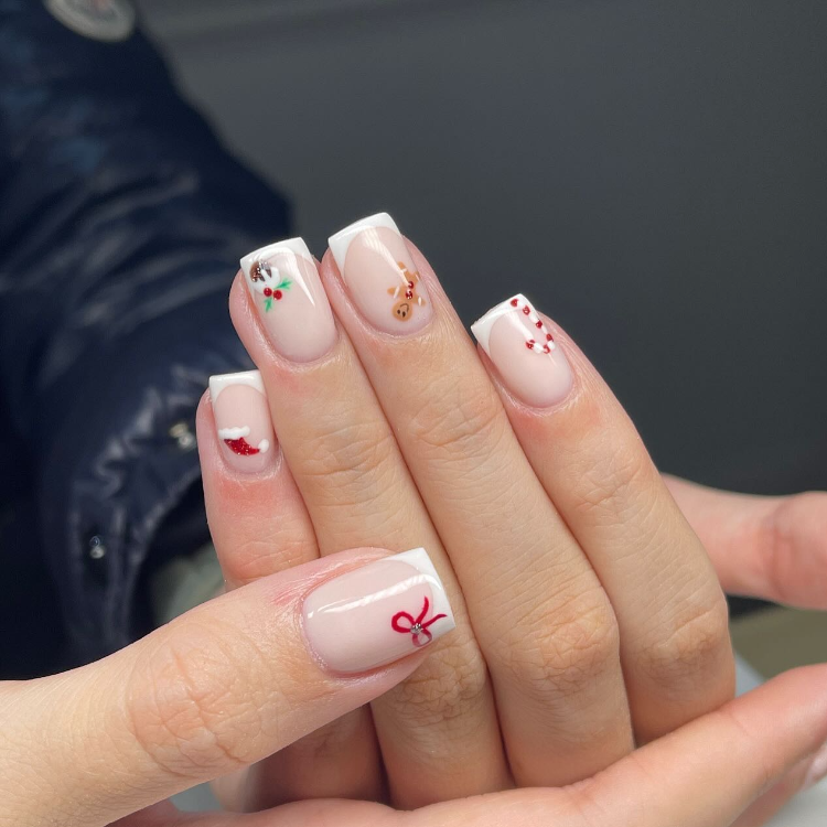 French Manicure with Subtle Christmas Motifs French Manicure with Subtle Christmas Motifs β Subtle Christmas Nails 2026