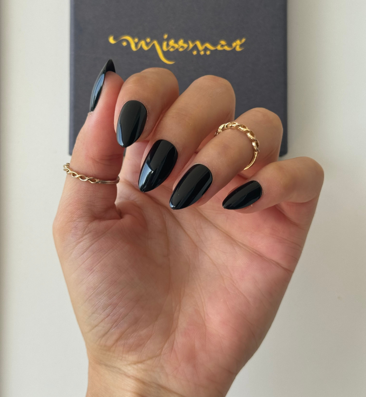 Sleek Glossy Black Winter Almond Nails Sleek Glossy Black Winter Almond Nails β Medium Winter Almond Nails