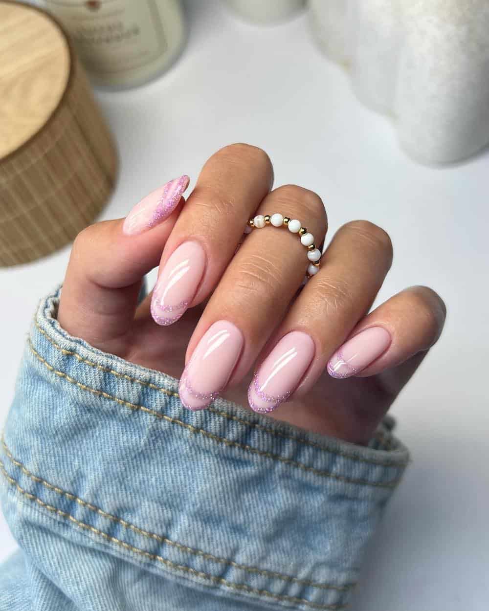One Hand Pale Pink Oval with Glitter French Tips One Hand Pale Pink Oval with Glitter French Tips β Coquette Winter Nails