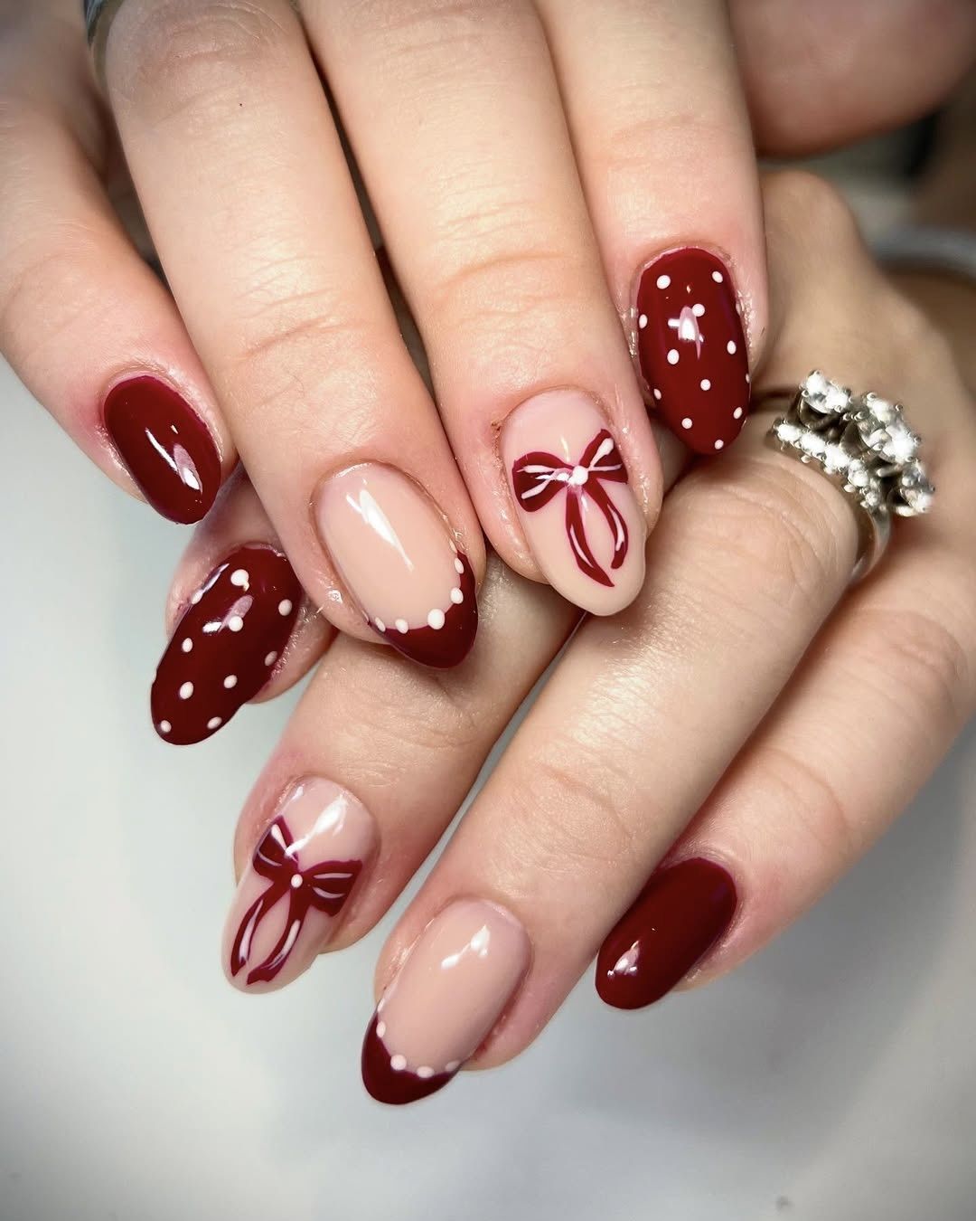 Glossy Deep Red & Nude with Red Bows — Christmas Gel Nails 2026