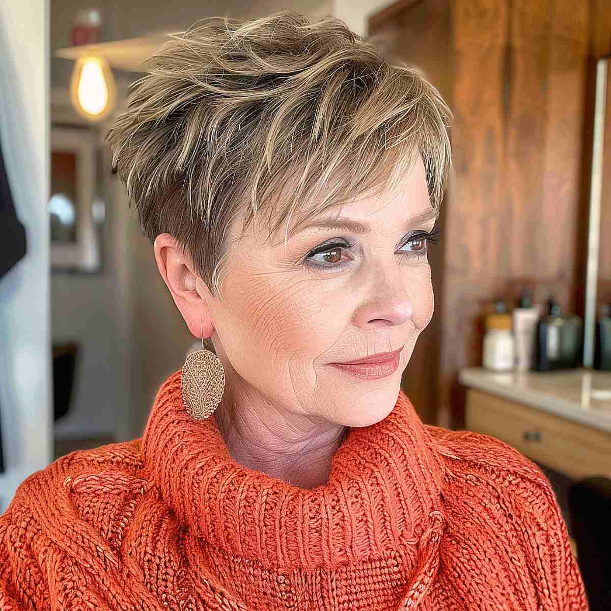 Textured Pixie with Honey Highlights — Winter Hairstyles for Women Over 60