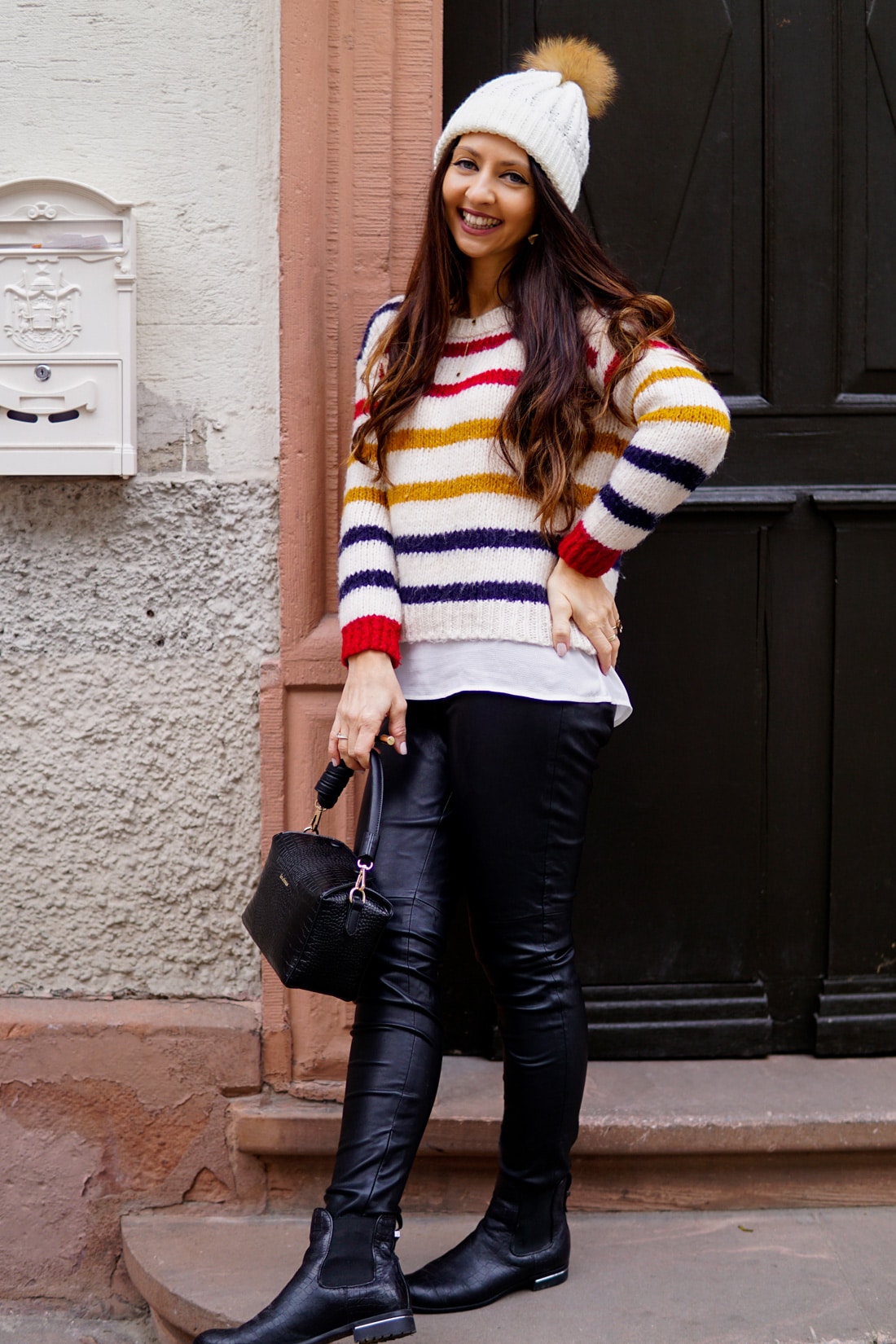 Black Slim Leather Pants with Striped Sweater, Beanie, and Chelsea Boots — Leather Pants Outfits
