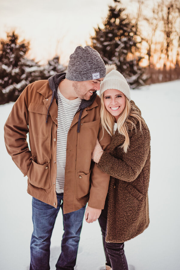 Casual Layers: Brown Teddy Coat and Hoodie for a Winter Couple's Photo Casual Layers: Brown Teddy Coat and Hoodie for a Winter Couple's Photo β Winter Family Photo Outfits