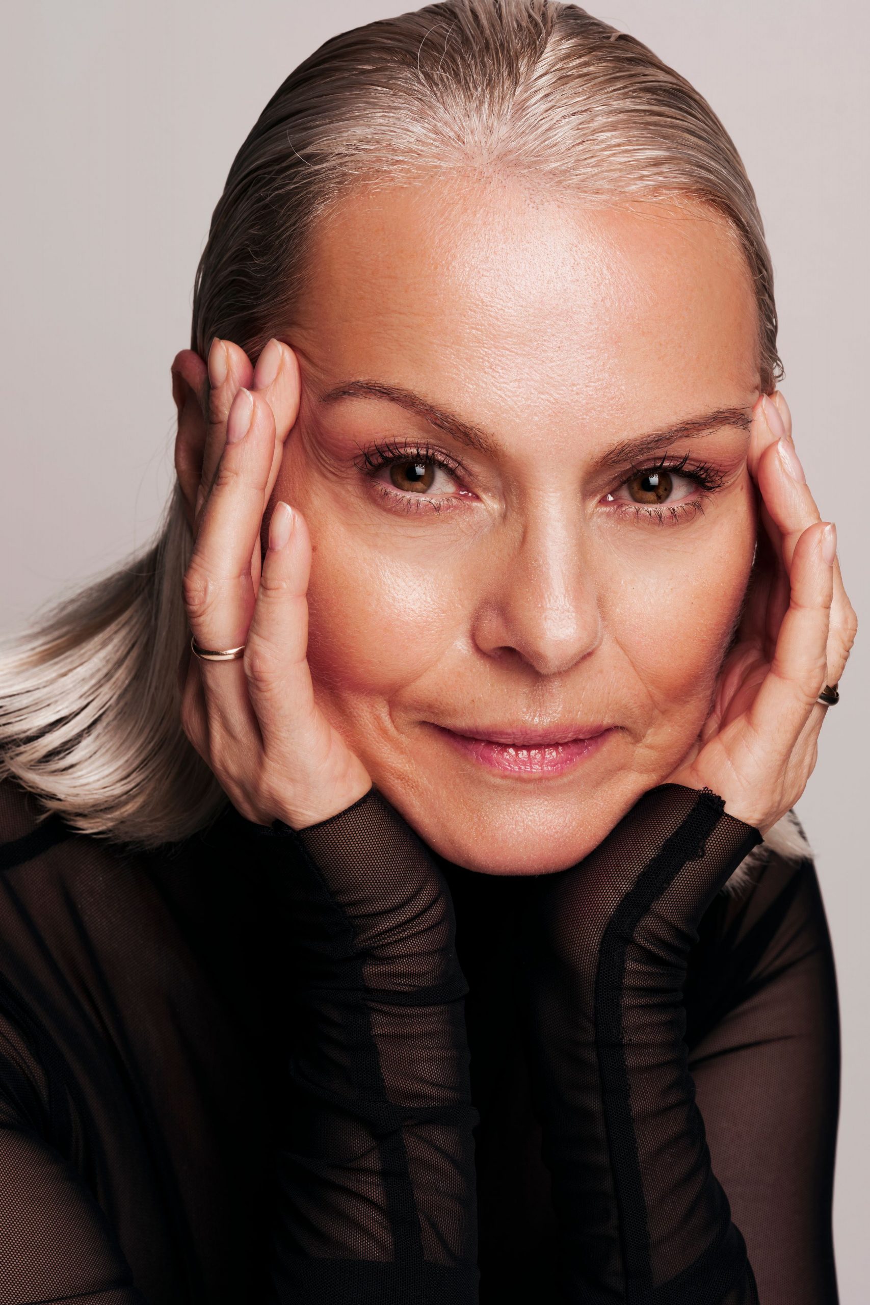 Sleek Silver Grey Bob With Blonde Highlights — Winter Haircuts for Women Over 60