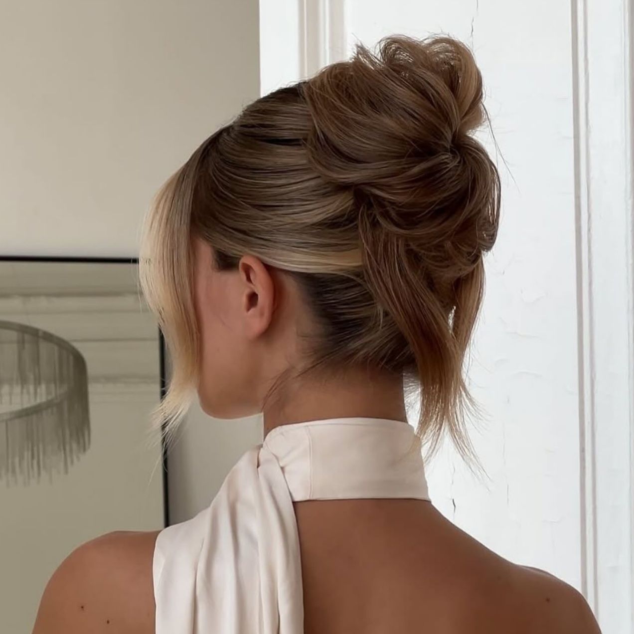 Messy Updo With Face-Framing Pieces Messy Updo With Face-Framing Pieces β Winter Formal Hairstyles