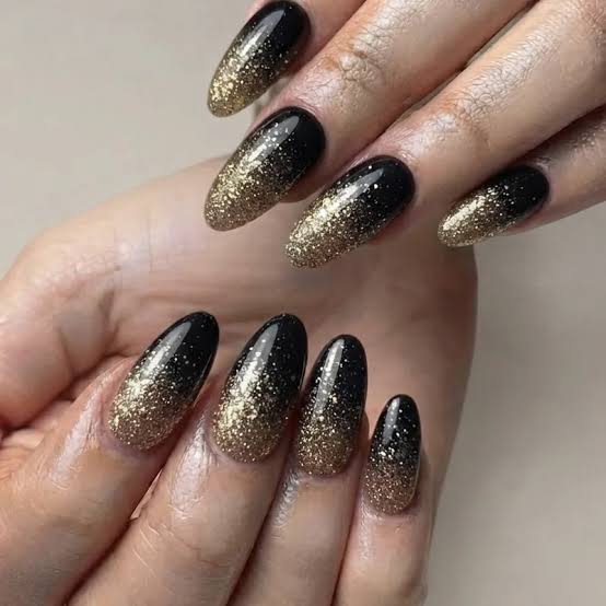 Black to Gold Glitter Ombre Almond Nails Black to Gold Glitter Ombre Almond Nails β New Years Nail Designs 2027